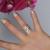 - gemstone stacker rings on the finger =